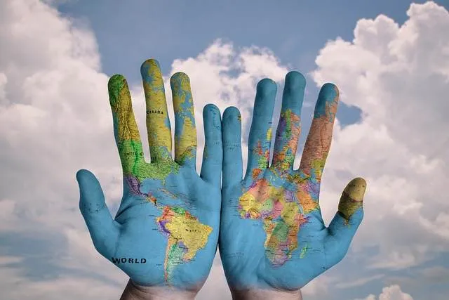 ywam_raleigh_hands_world_map